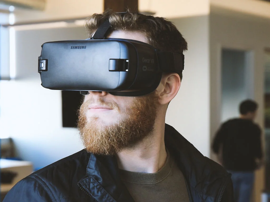 The future of VR and VR users: Image of a man wearing a black VR headset